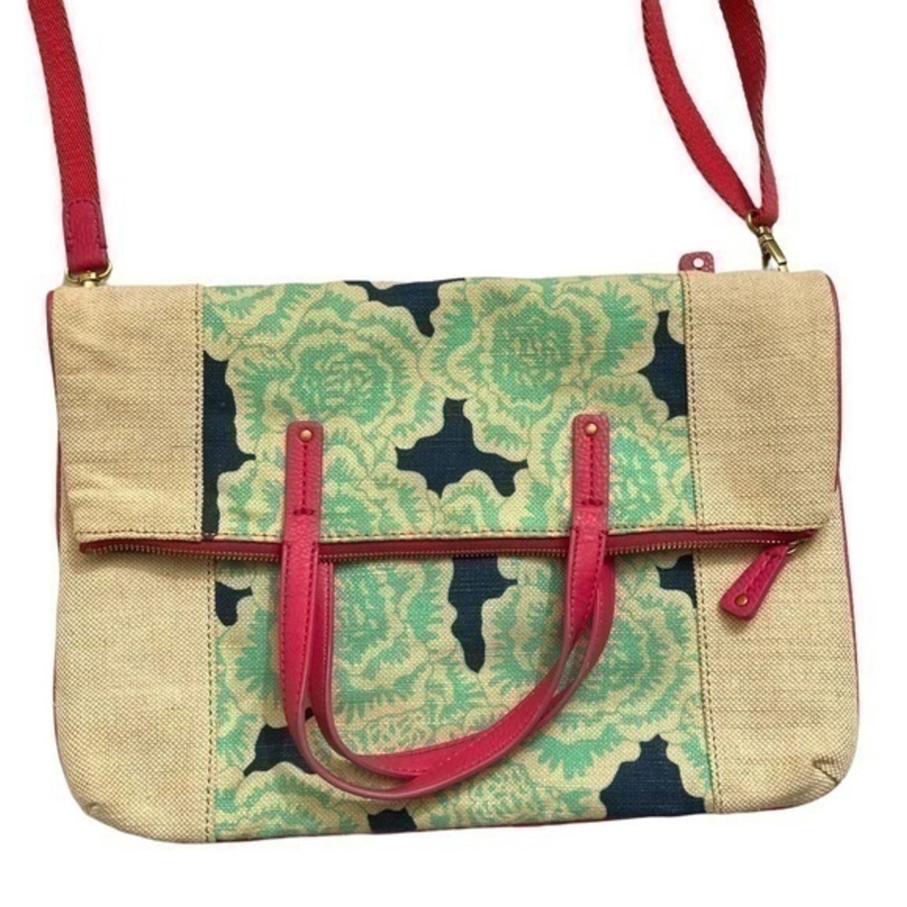 Fossil print canvas and pink leather fold over crossbody bag w/ top handles